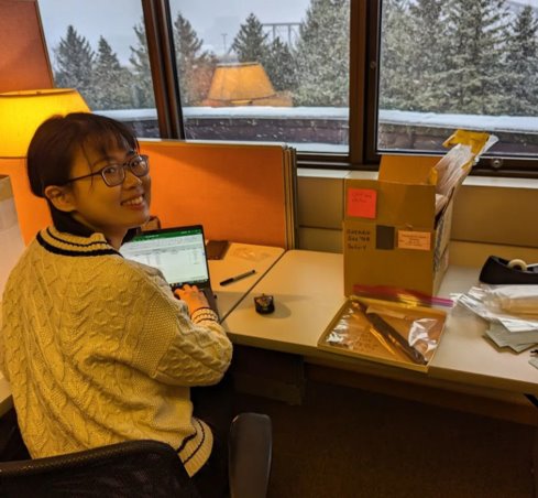 Seungyeon Hong sitting at a desk.
