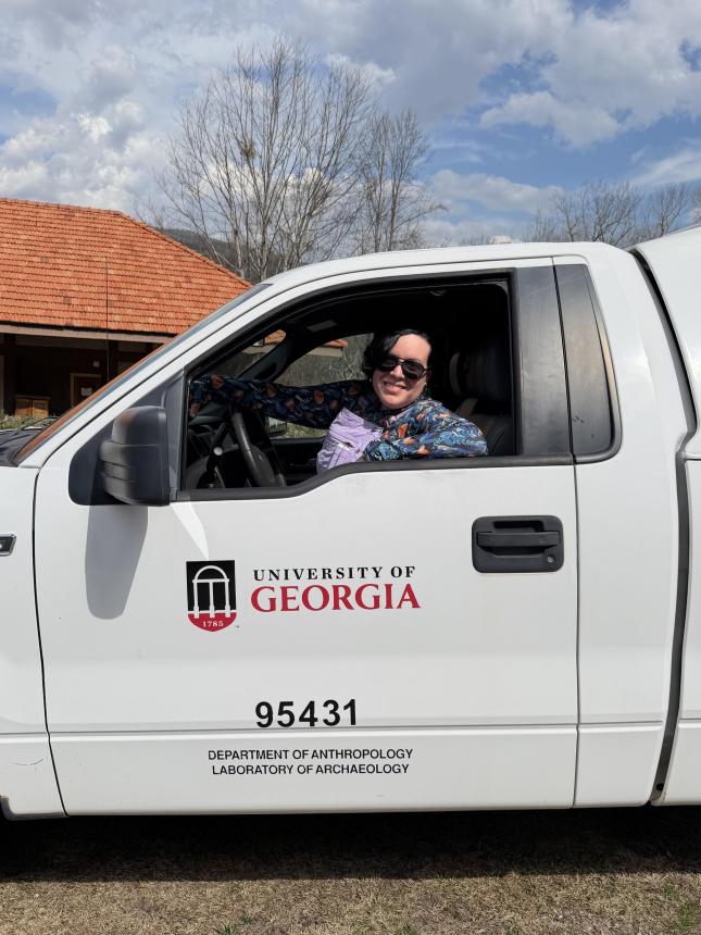 Marcie in the Archaeology Lab truck.
