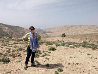 Dr. Pilaar Birch standing at her field site in Jordan