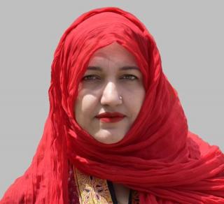 Dr. Saadia Sultan Wahla wearing red scarf
