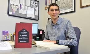 Ben Steer with his book, "The Archaeology of Houses and Households in the Native Southeast"