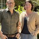 Dr Victor Thompson and Dr Jennifer Birch stand outside